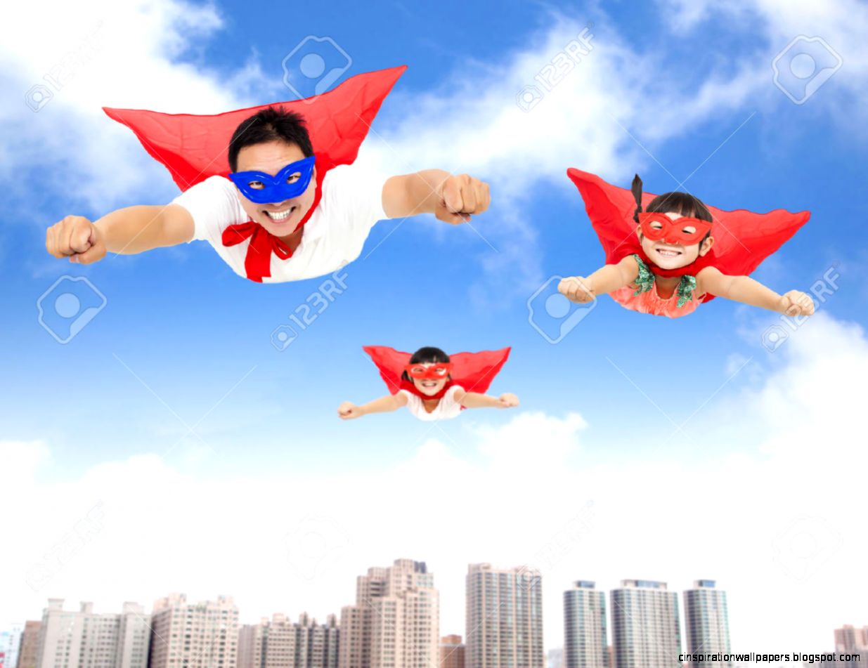 Superman And Daughters Flying In The Sky With Buildings Background Superman And Daughters Flying In The Sky With Buildings Background
