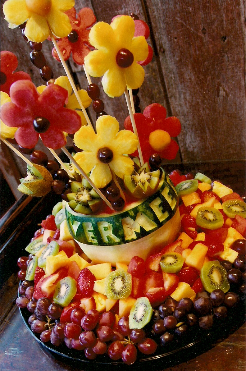 The Fruity Flower Girl Fruit Arrangements and Carvings