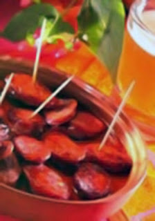 Chorizo cooked in cider served as an appetizer