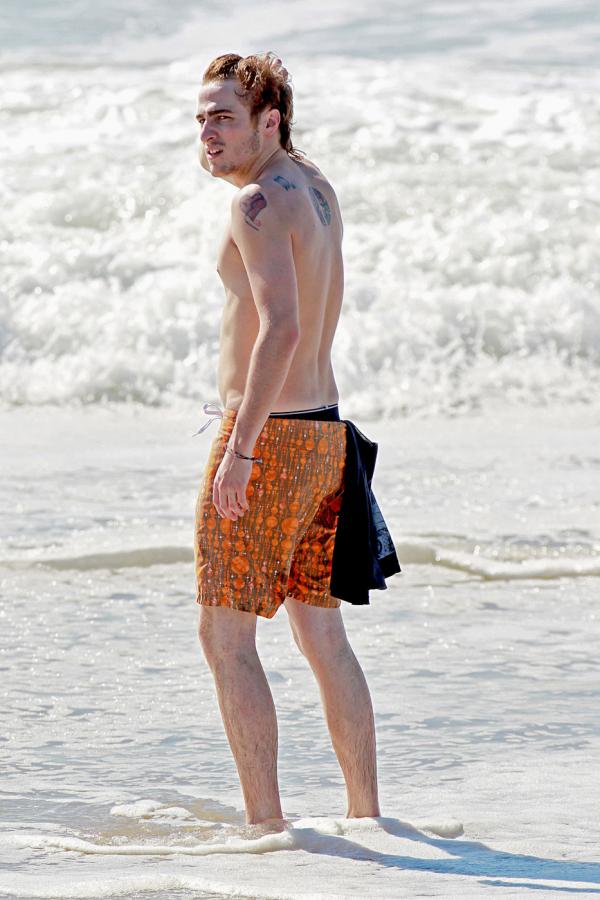 Kendall and Logan Shirtless at the beach.