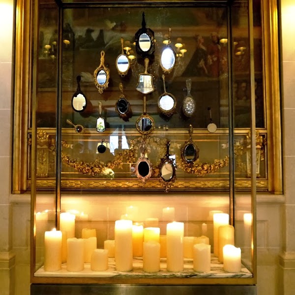Le Meurice Hotel reception candle and mirror display in Paris