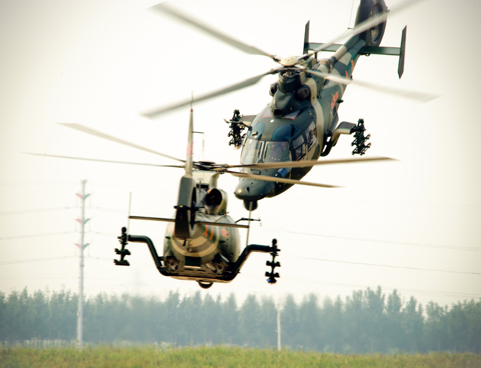 Helicopter News - Página 6 PLA+Army+Aviation+WZ-10+Thunder+Aerobatic+Helicopter+Team+Chinese+performs+airshow+attack+missile+atgm+launched++(1)