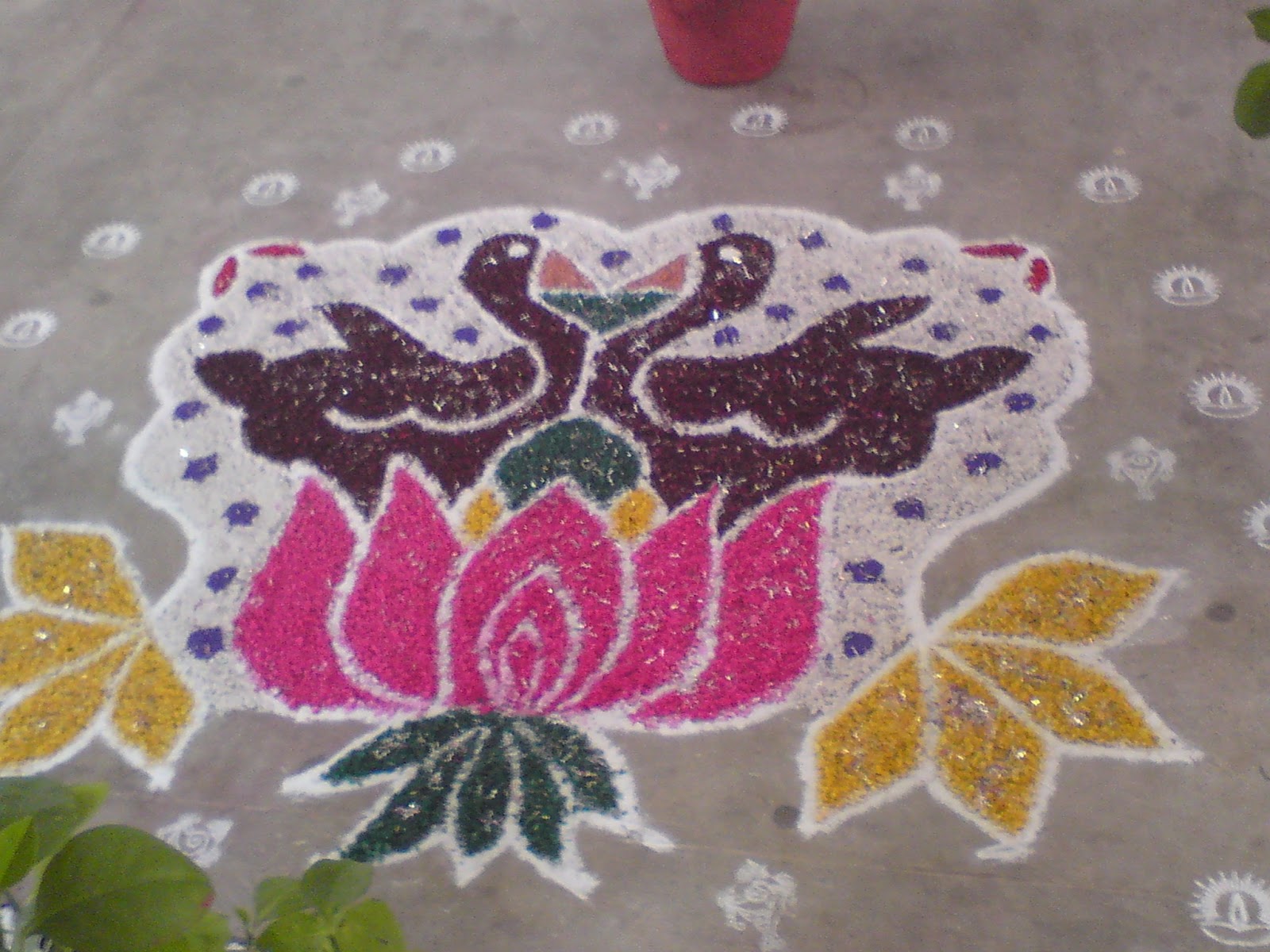 Beautiful Kolam and Painting Lotus Kolam