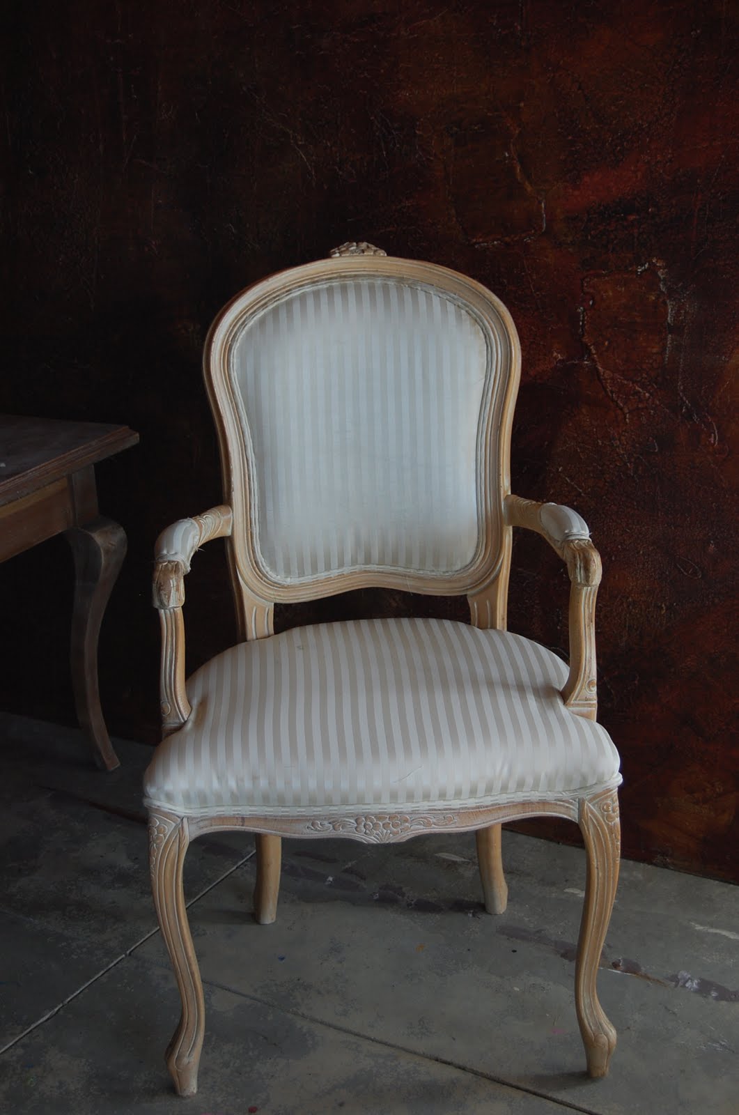 A pair of French elegant chairs with a kick