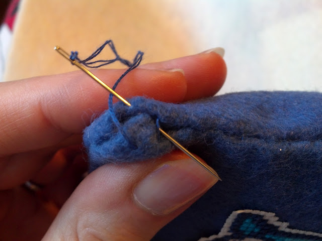 Tie the loose end to the last stitch in the seam