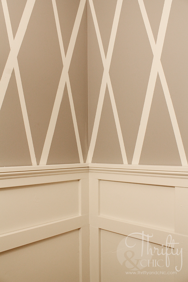 Bathroom makeover with diamond pattern wall using painter's tape and board and batten