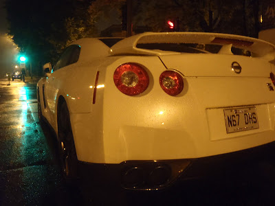 White Nissan GTR Rain Green Light