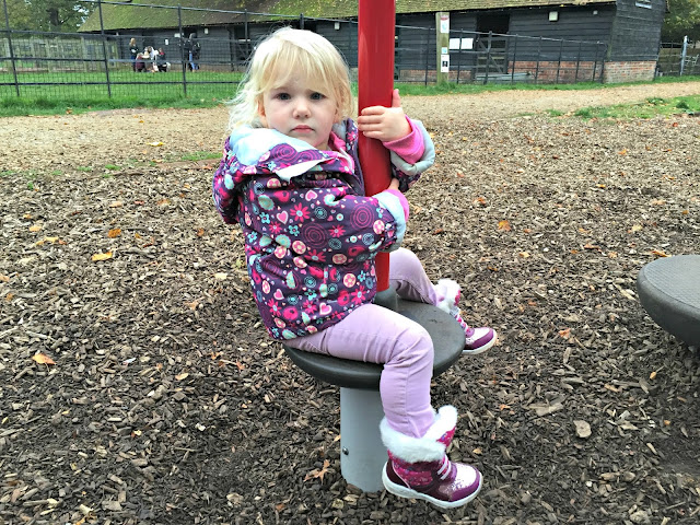 Tin Box Tot playing on the adventure playground