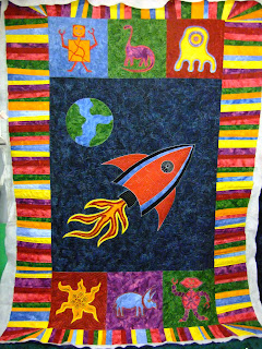 Free Motion Quilted space quilt