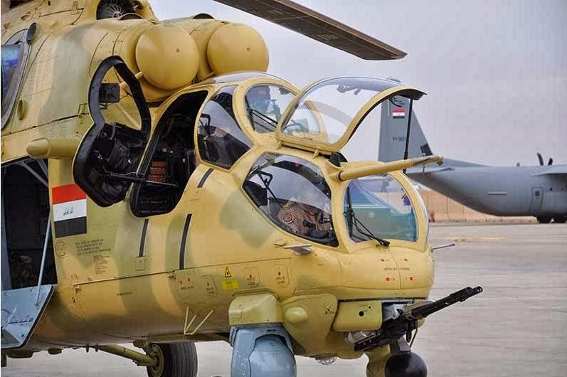 المي-35 بكامل تسليحها  Iraqi+Mil+Mi-35M+Hind+Gunship+Helicopter+%282%29