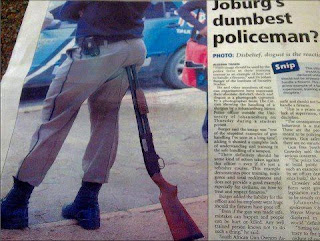 johannesburg policeman sitting on shotgun funny