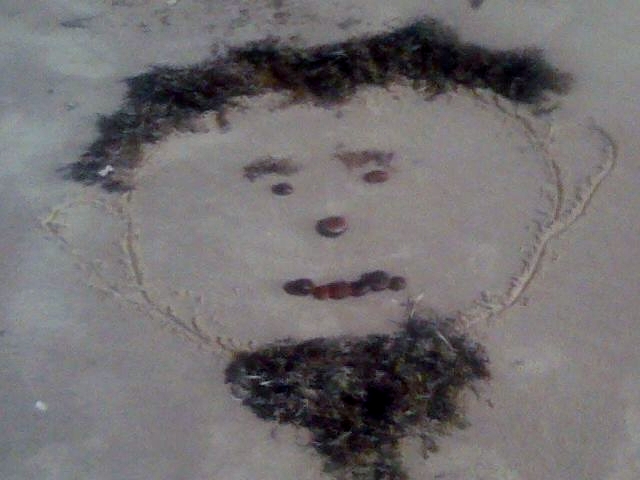 Face in the Sand