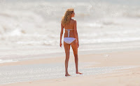 Kate Upton  white bikini  at a beach