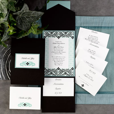 The Purple Mermaid features the finest wedding invitation packages on the