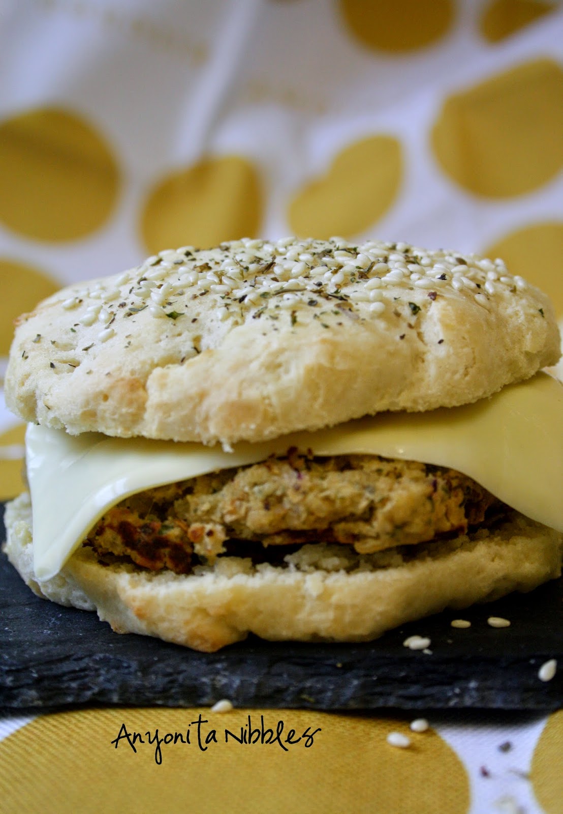 These vegetarian lemon & chickpea dukkah burgers on homemade gluten free buns would be perfect for a barbecue.