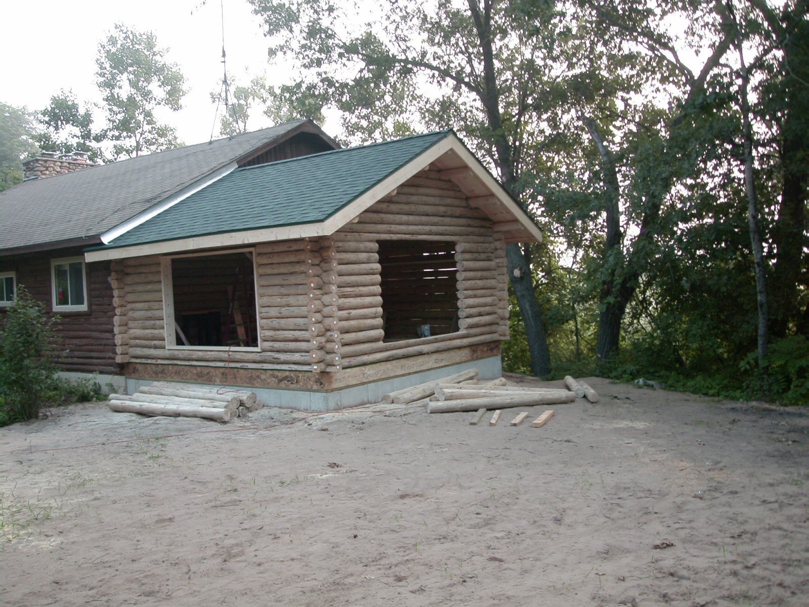 The Cabin Countess Putting a New Addition on a Log House