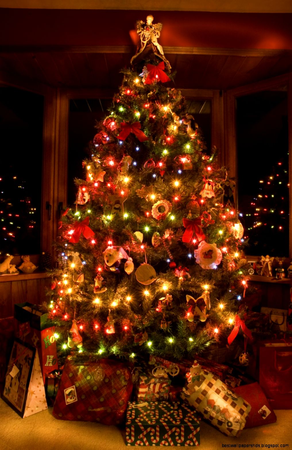 Why do we put lights on christmas trees Why do we put lights on christmas trees