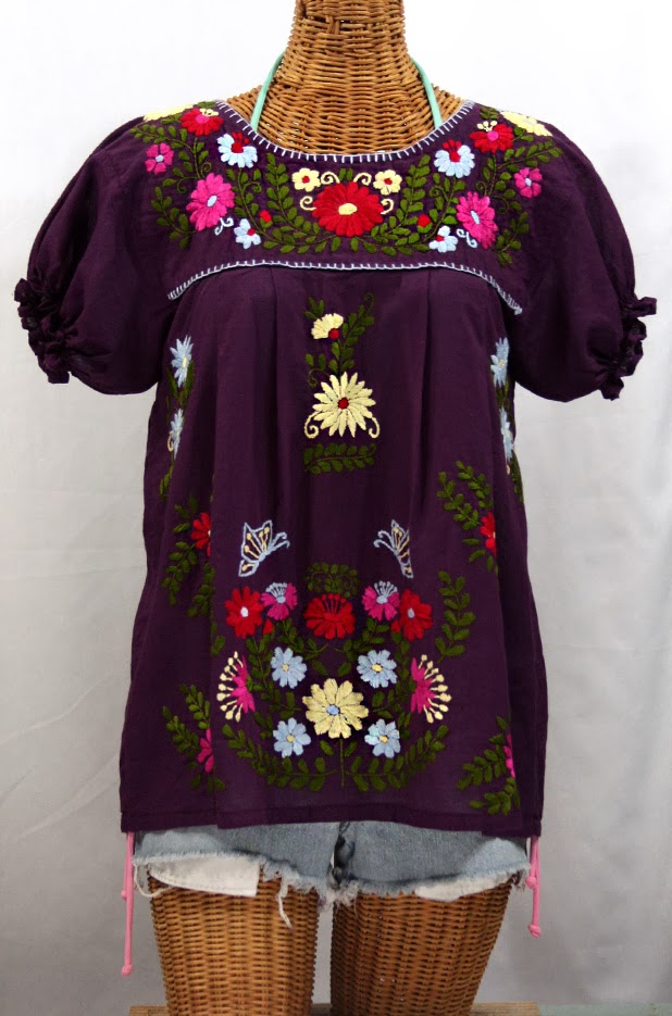 http://www.sirensirensiren.com/shop/new!-embroidered-peasant-tops/mexican-blouse-puff-sleeve-mariposa-color/embroidered-mexican-style-peasant-top-mariposa-color-plum