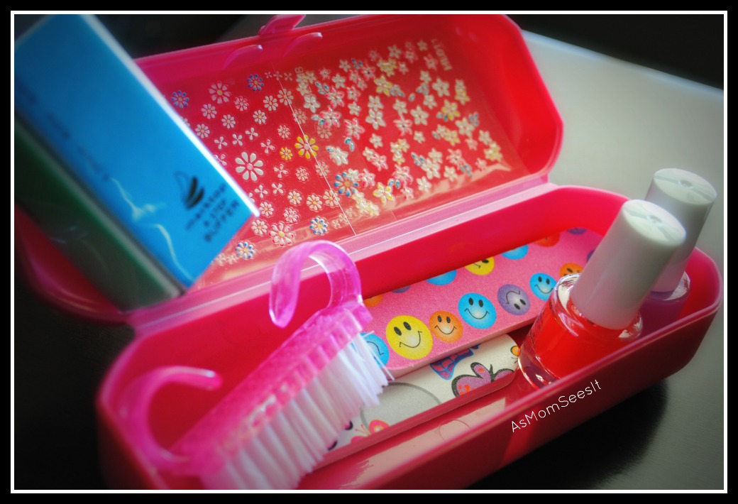 This adorable kit has a nail brush, two nail files, a nail buffer,