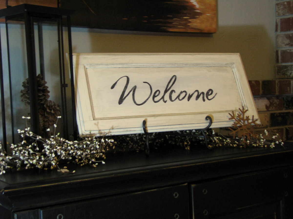 blue roof cabin Sign out of Door