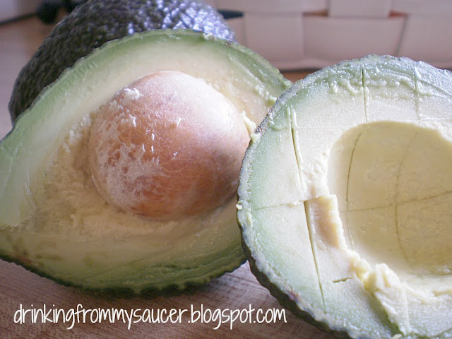 halved avocado with pit