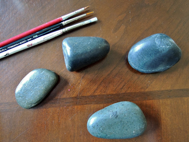 Painted fish stones