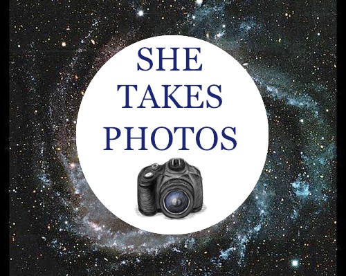 She Takes Photos