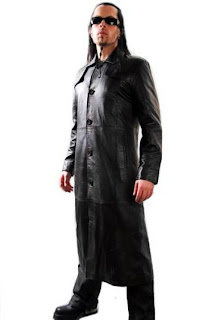 long-black-leather-gothic-trench-coat-man-long-hair-black-sunglasses-boots.jpg