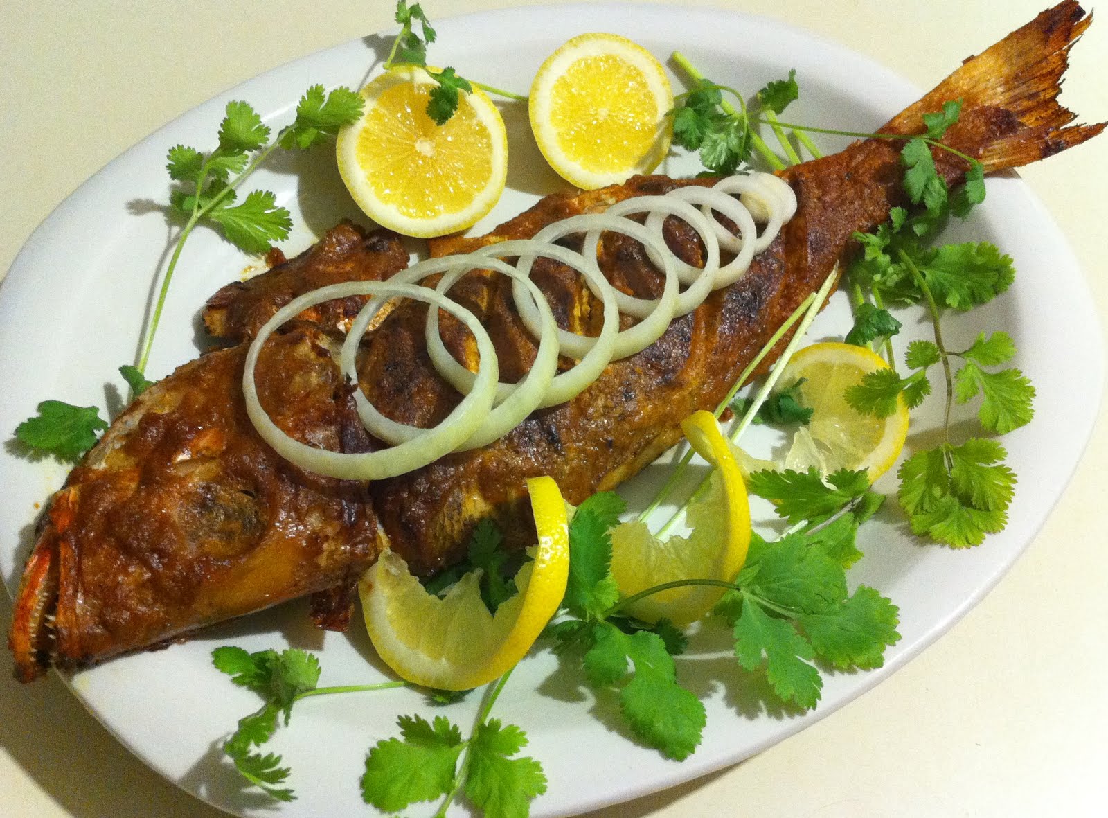 Healthy Food Recipes: Fish baked in garlic sauce..