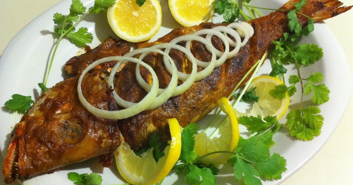 Healthy Food Recipes Fish baked in garlic sauce..