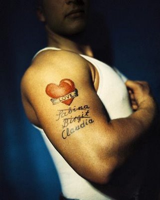 girls tattoos on arm. heart tattoos for girls.