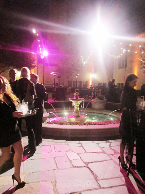 People mingling at a book signing at the Greystone Mansion