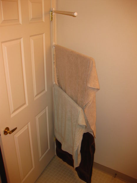 Towel organizer behind the door :: OrganizingMadeFun.com Towel organizer behind the door :: OrganizingMadeFun.com