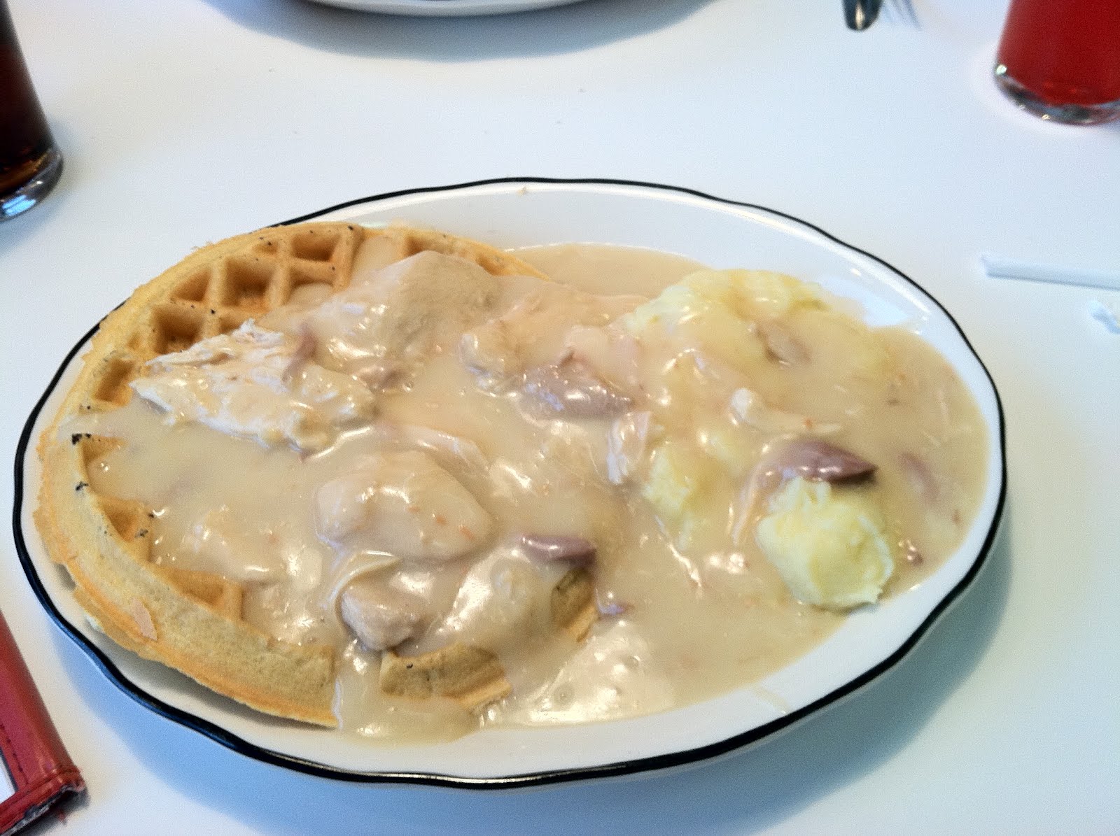 'Burgh Feeding Chicken and Waffles