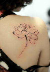 lotus flower tattoo on the back