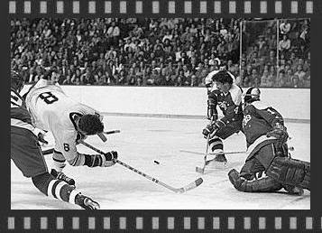 11/7/74:  Puck skitters to Bill Mikkelson 