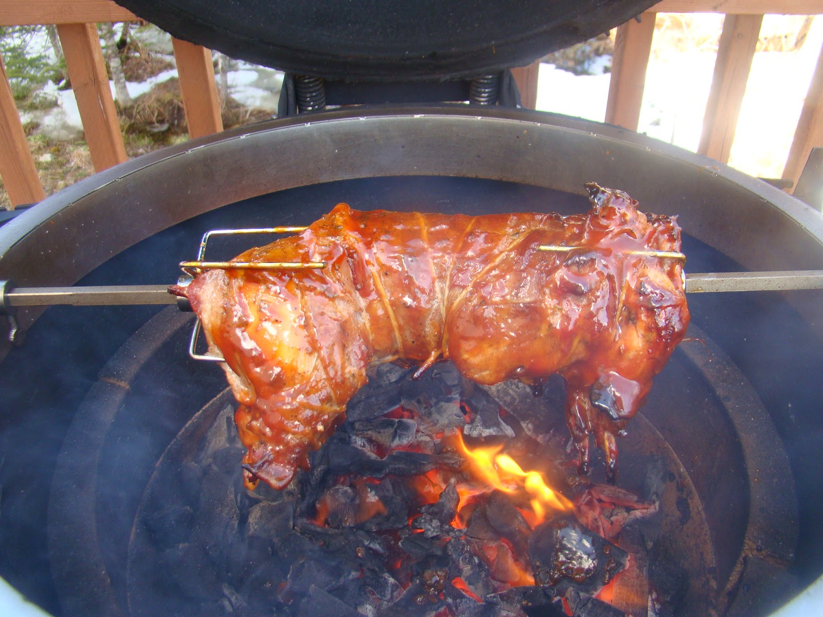 HRM CREATIVE BBQ Bacon wrapped Rotisserie Rabbit on the BBQ