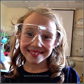 girl wearing science goggles