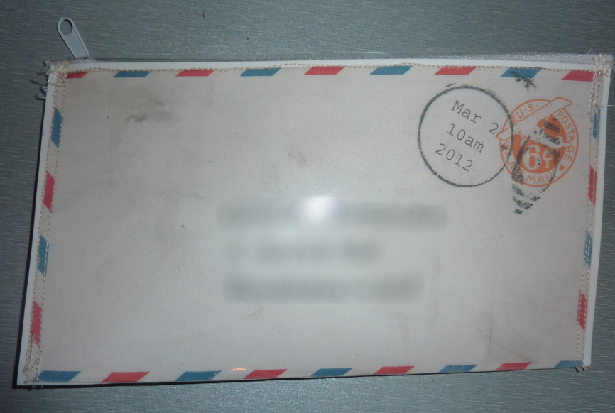 Jovial Spondoodles Sewing with laminated paper, and vinyl wallets from