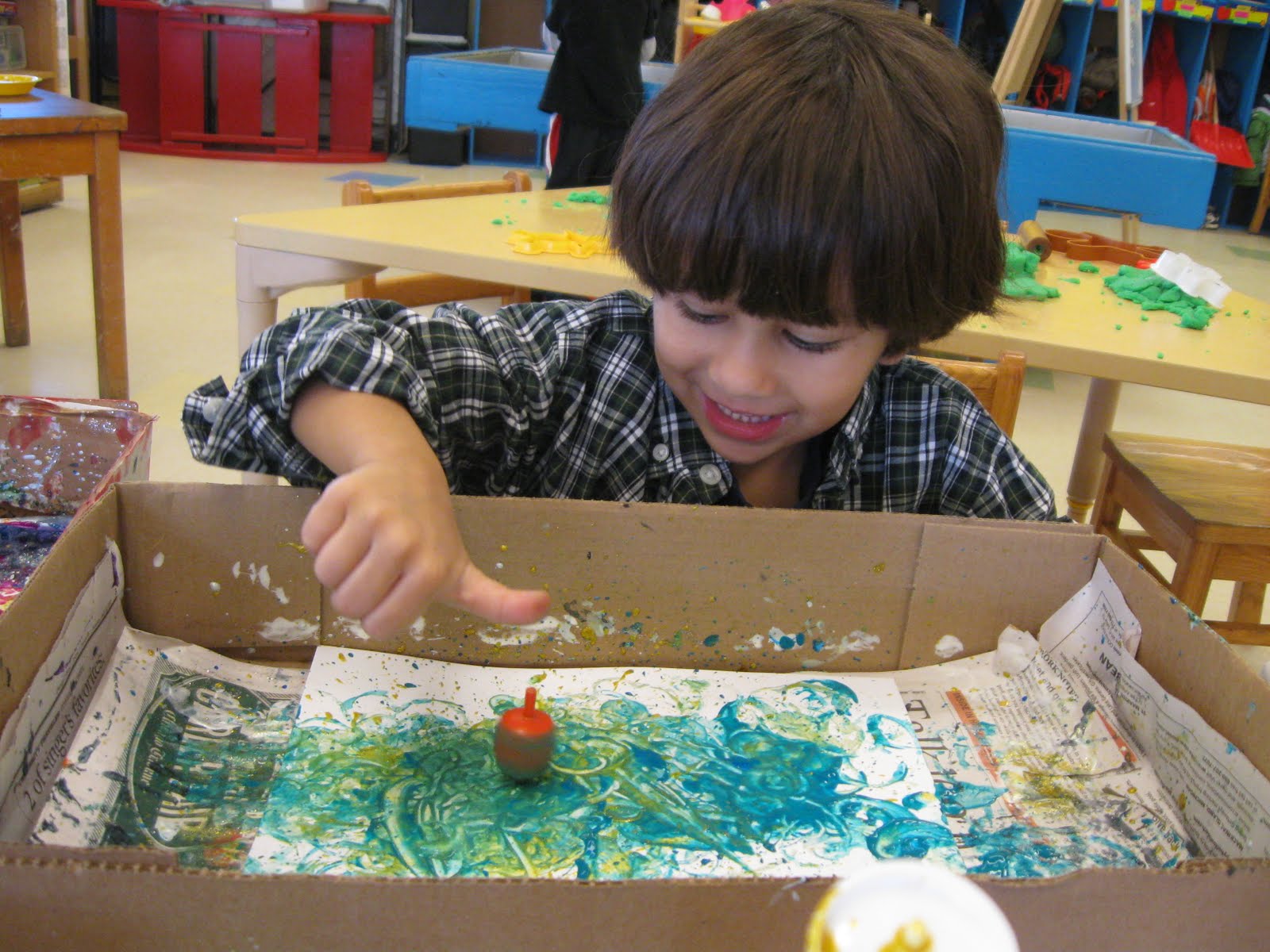 AAUW Nursery School: Painting with dreidels