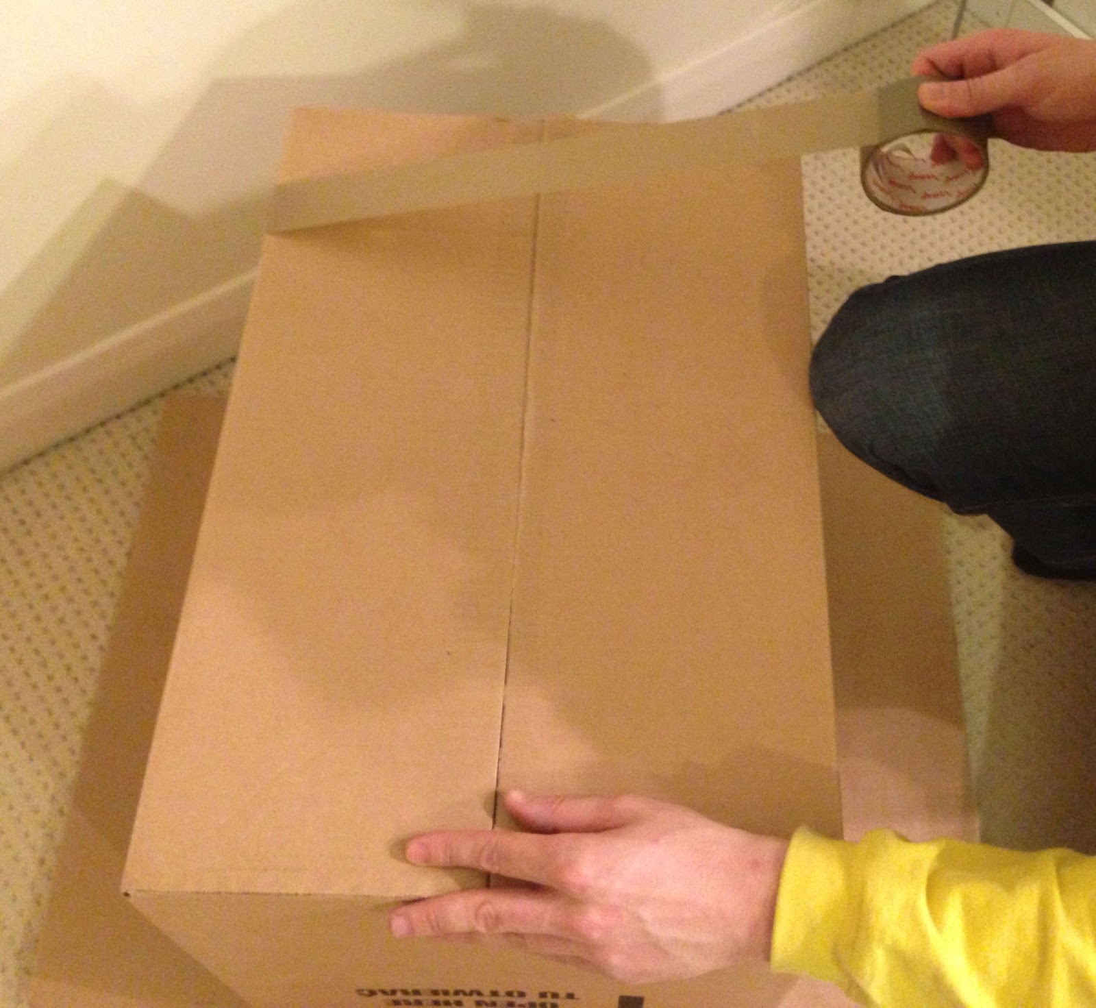 How to tape up a box for removals We Like 2 Move It Removals Hereford