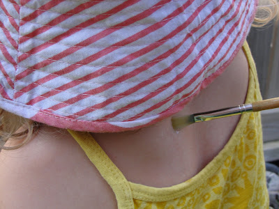 painting water on child's body