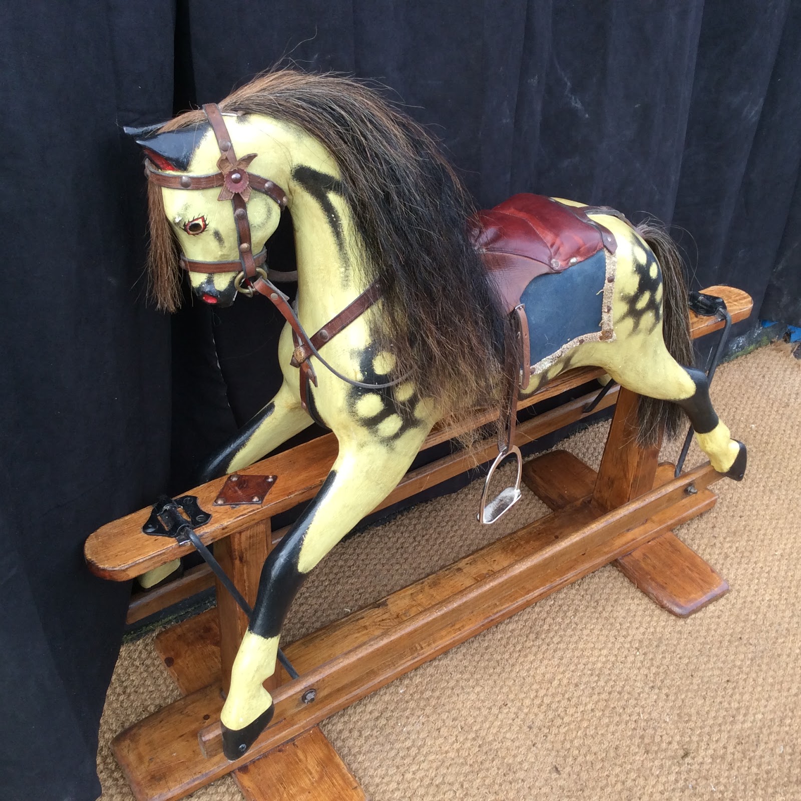 antique rocking horse with real horse hair