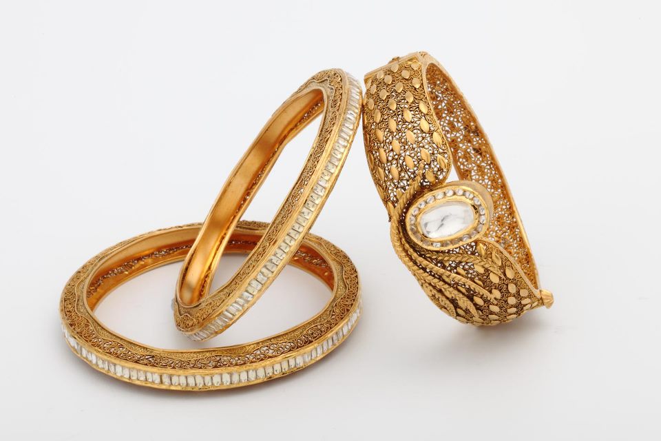 Indian Jewellery and Clothing Designer gold bangles from Orra diamonds