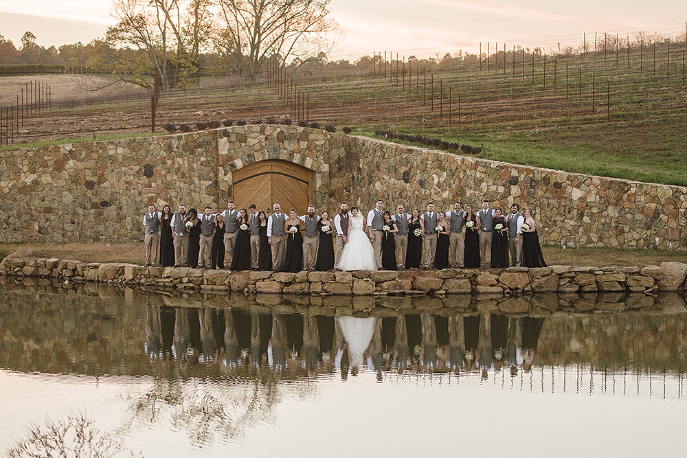 gorgeous sunset portraits of the bride and groom at Stone Tower Winery in Leesburg