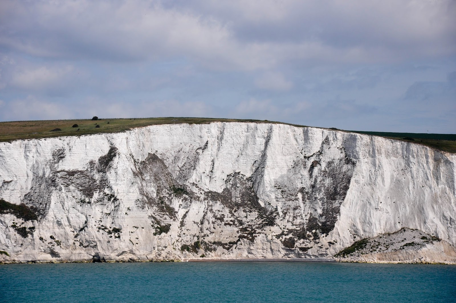 A close-up of the white cliffs of Dover seen from a DFDS ferry after crossing the English Channel back from France