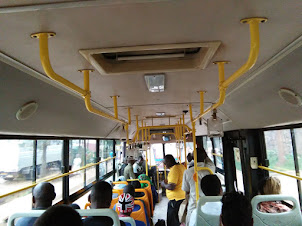 In the local public bus in Kigali.