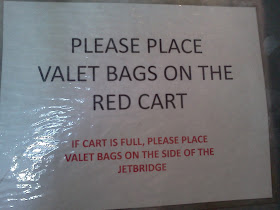 Please Place Valet Bags On The Red Cart