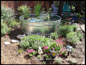 Garden Path Wanderings: Stock Tank Water Garden is in!