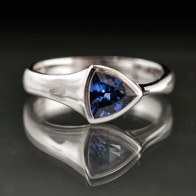 Trillion lab created sapphire ring in palladium